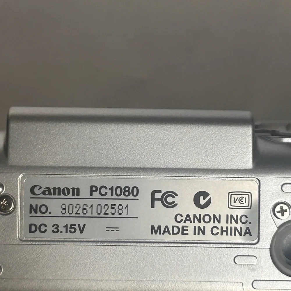 Canon PowerShot PC 1080 Digital Camera  Silver Tested  No USB w/Box ,Manual & SD